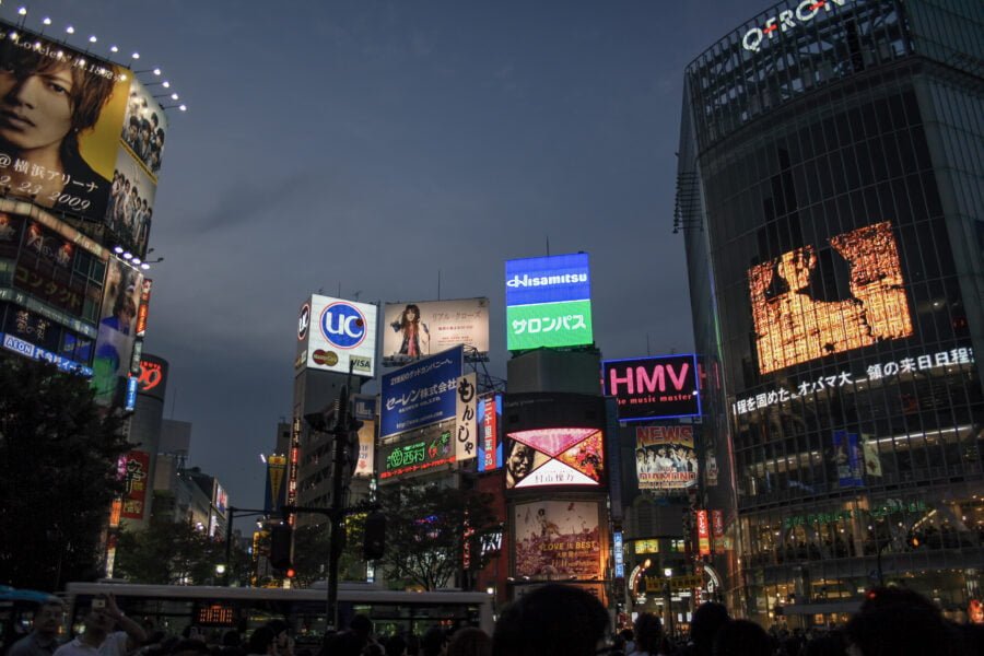 Shibuya Crossing In Tokyo At Dusk