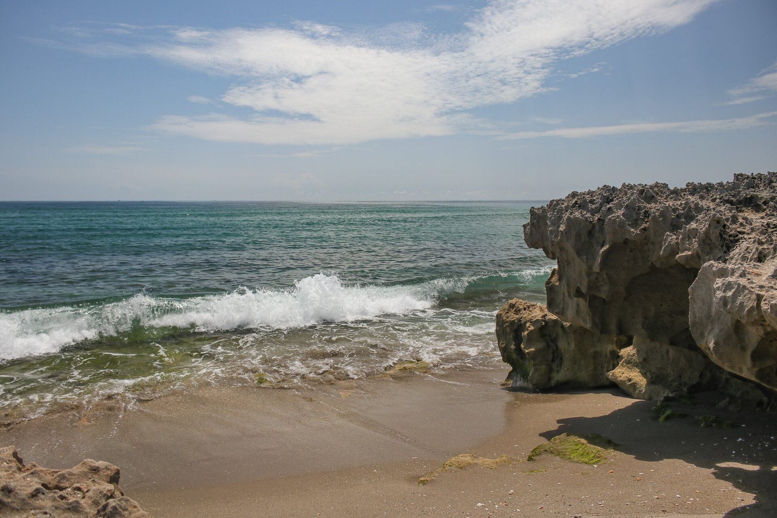 Waves On Beach With Rocks
