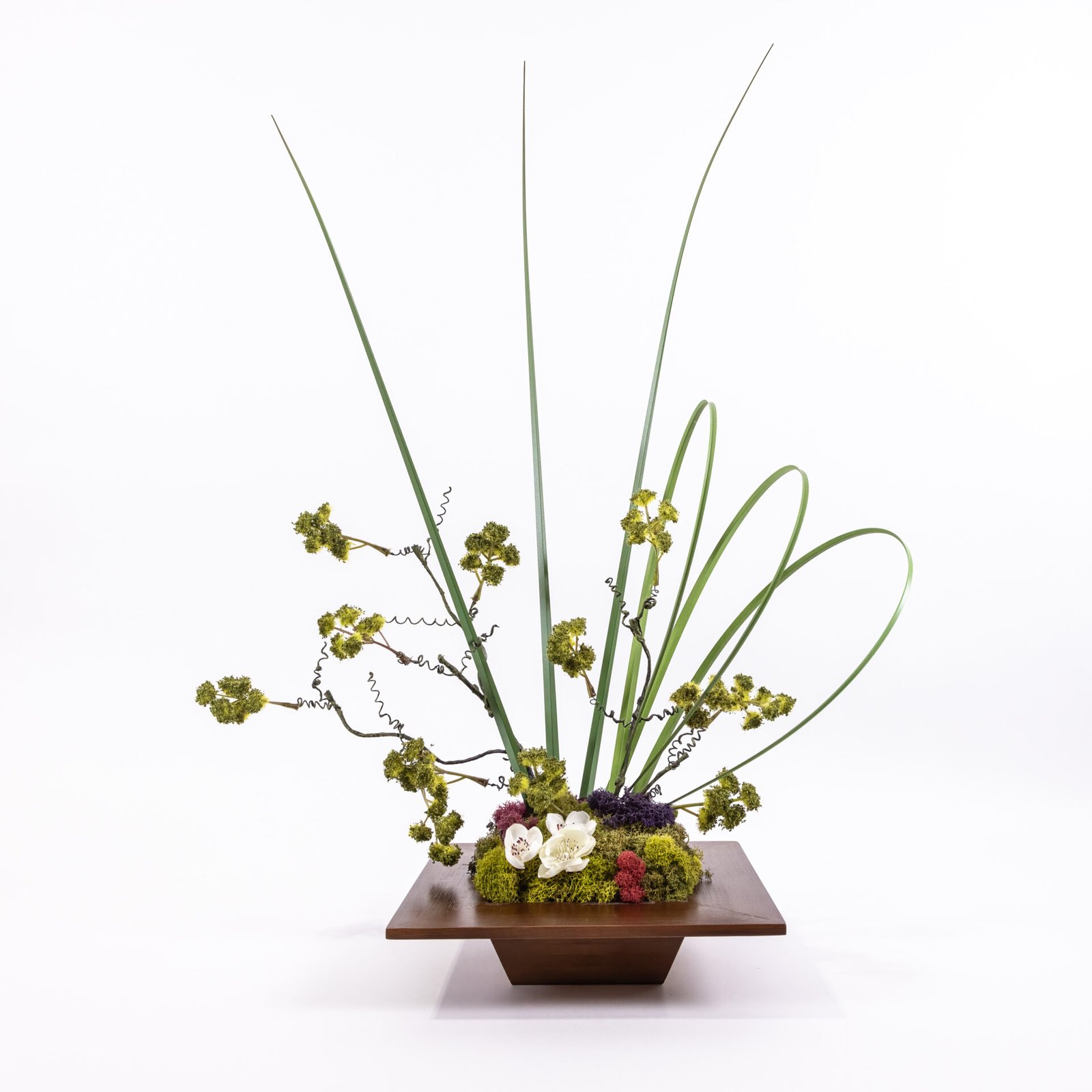 Square Brown Vase With White Flowers And Grass Blades