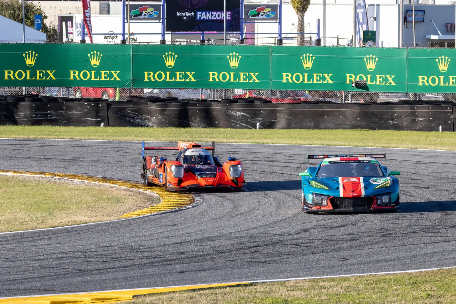 17 Awa Corvette And 04 Crowdstrike Racing Oreca Through International Horseshoe At Daytona International Speedway 2024