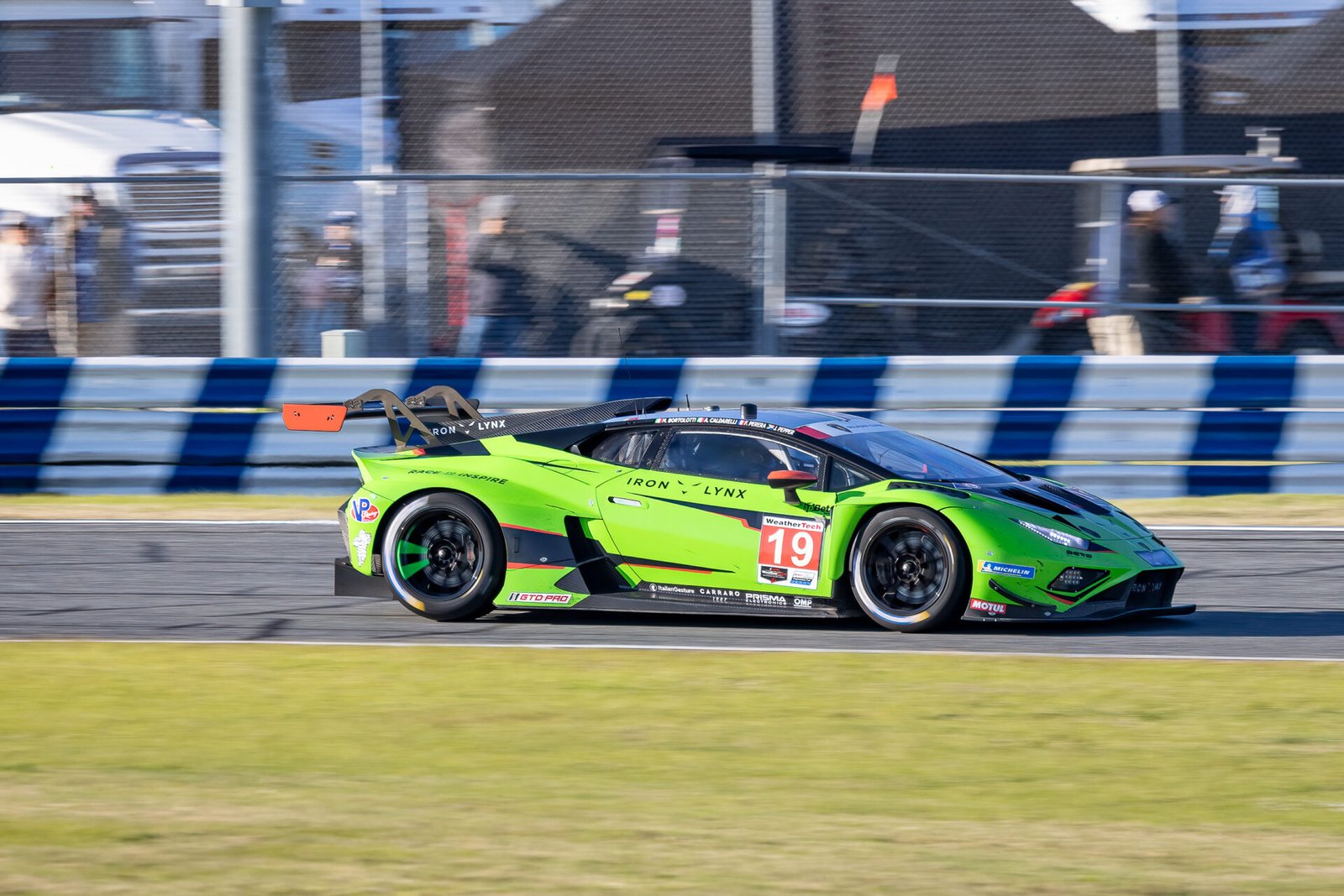 19 Iron Lynx Racing Lamborghini Entering International Horseshoe At Daytona International Speedway 2024