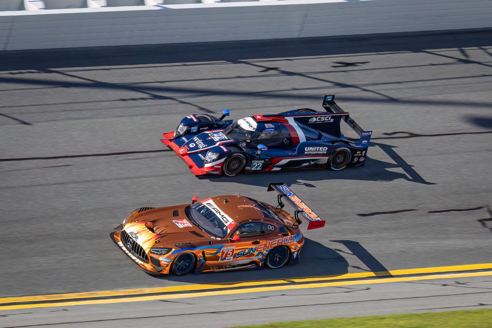 22 United Autosports Oreca And 75 Sun Energy 1 Racing Mercedes In Turn 1 At Daytona International Speedway 2024