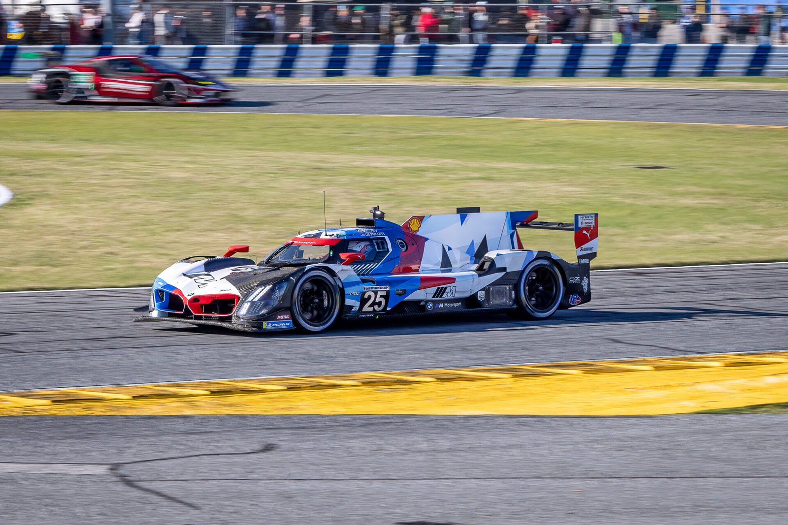 25 Team Rll Bmw Exiting International Horseshoe At Daytona International Speedway 2024