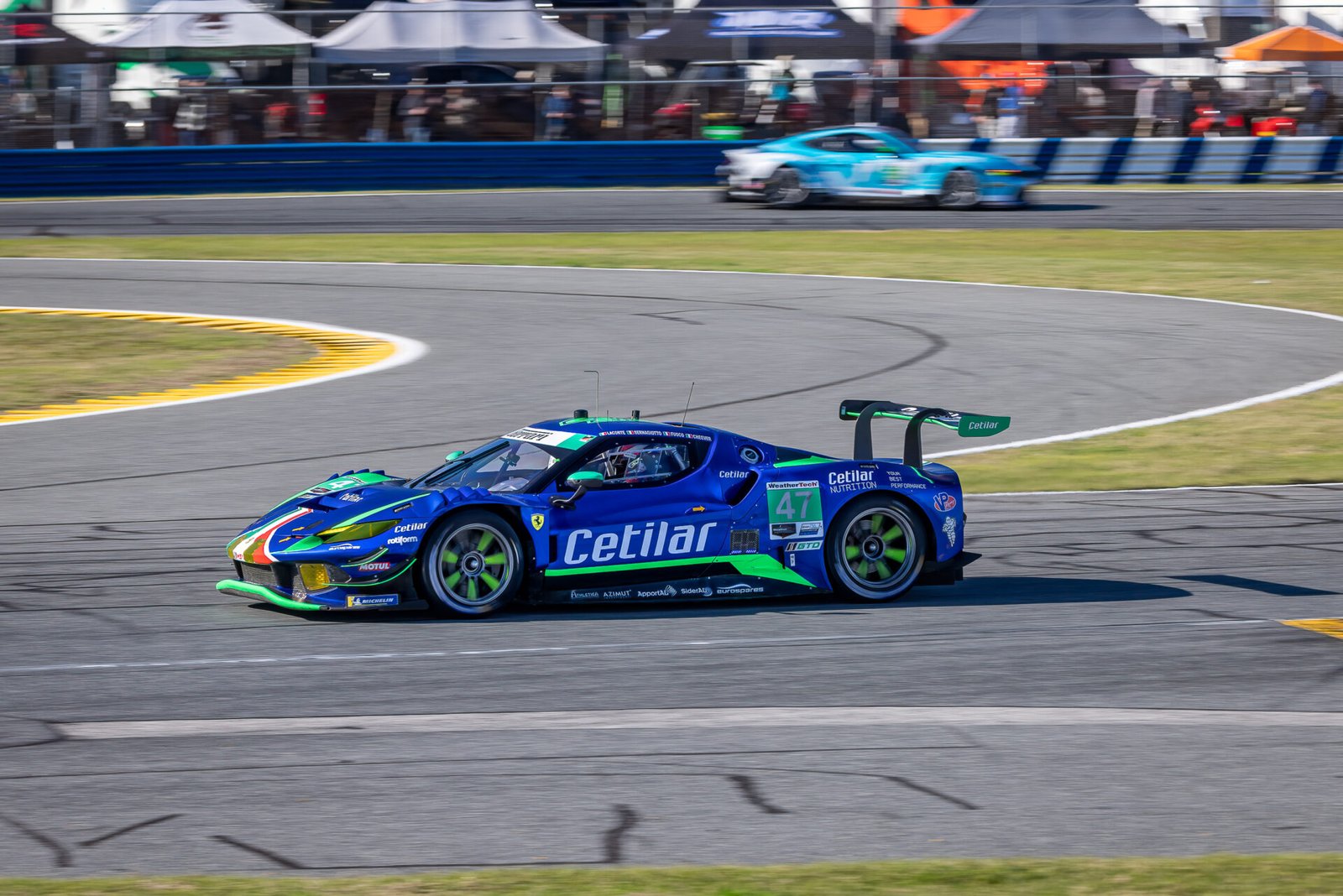 47 Cetilar Racing Ferrari Exiting International Horseshoe At Daytona International Speedway 2024