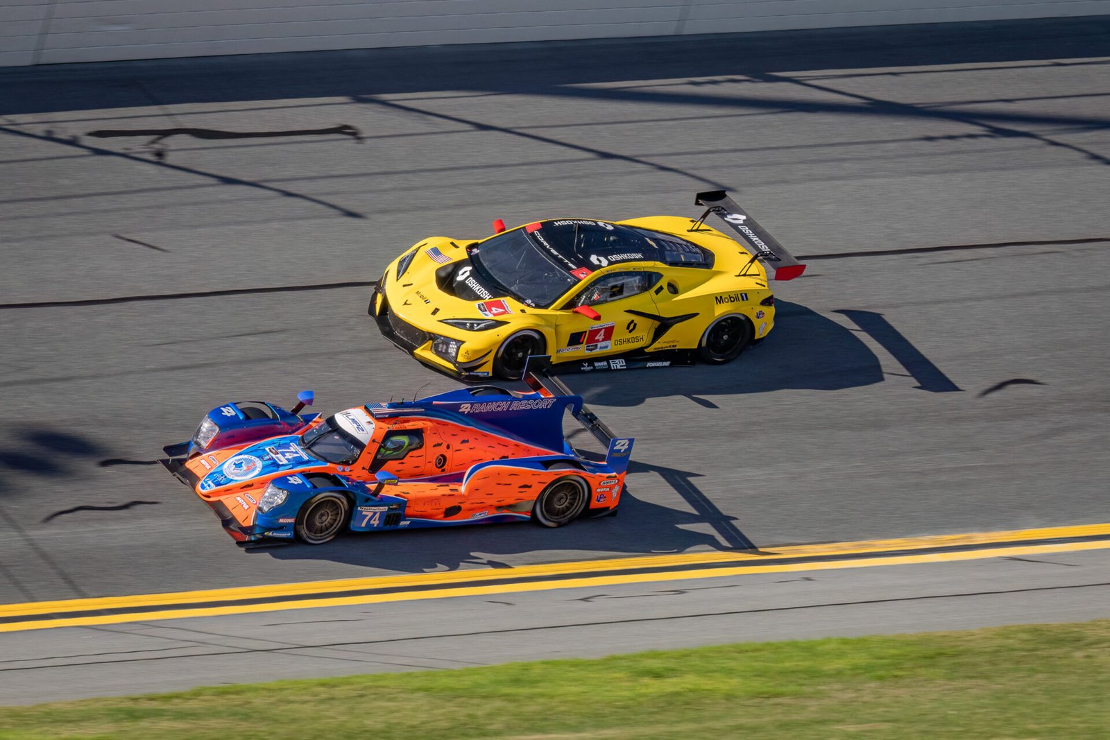 74 Riley Motorsports Oreca And 4 Pratt Miller Motorsports Corvette In Turn 1 At Daytona International Speedway 2024