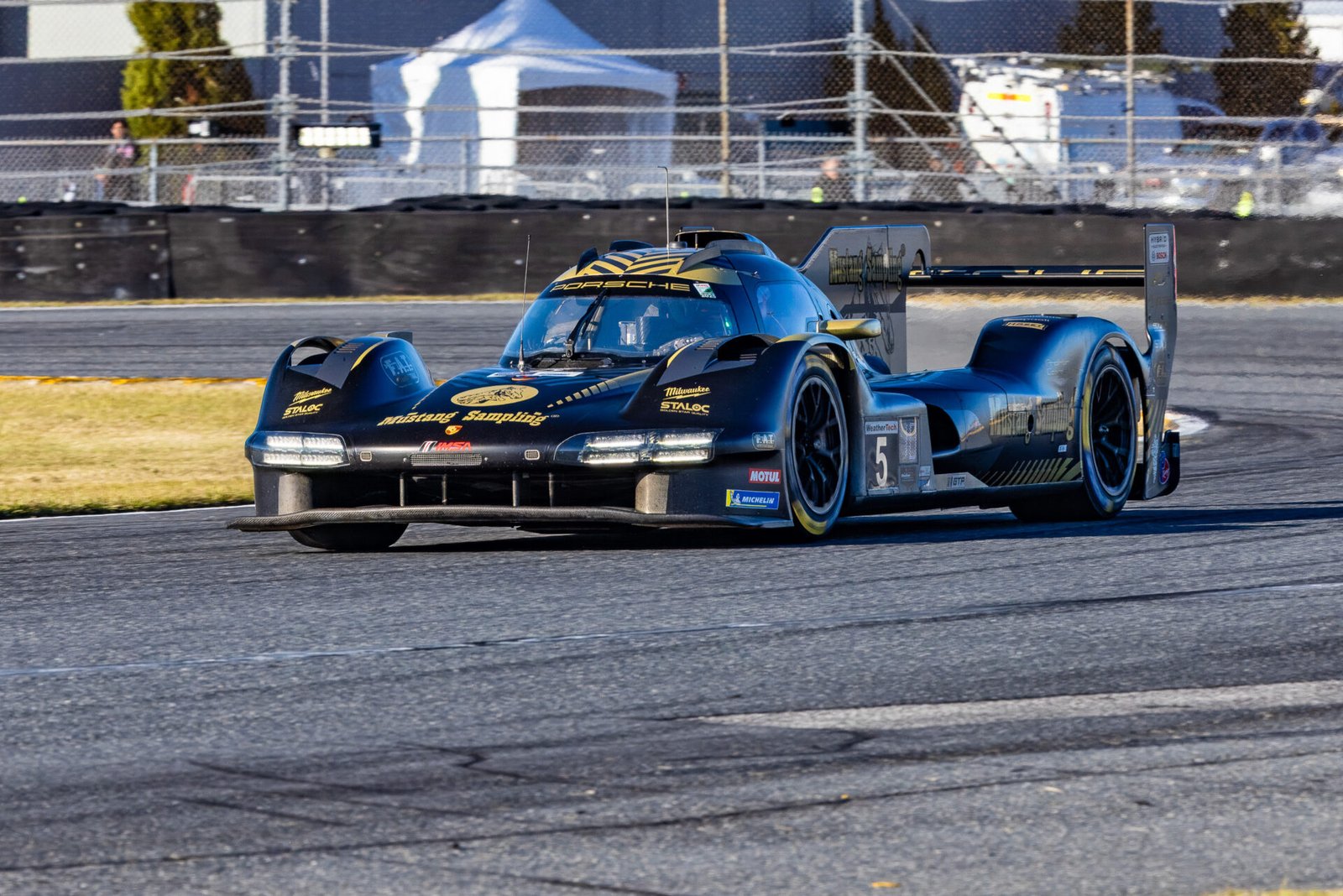 5 Proton Competition Porsche Exiting International Horseshoe At Daytona International Speedway 2025
