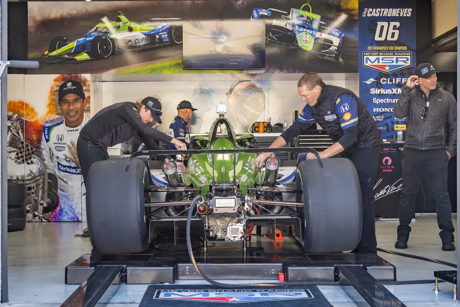 Helio Castroneves Team Reattaches Cowling After Making Changes