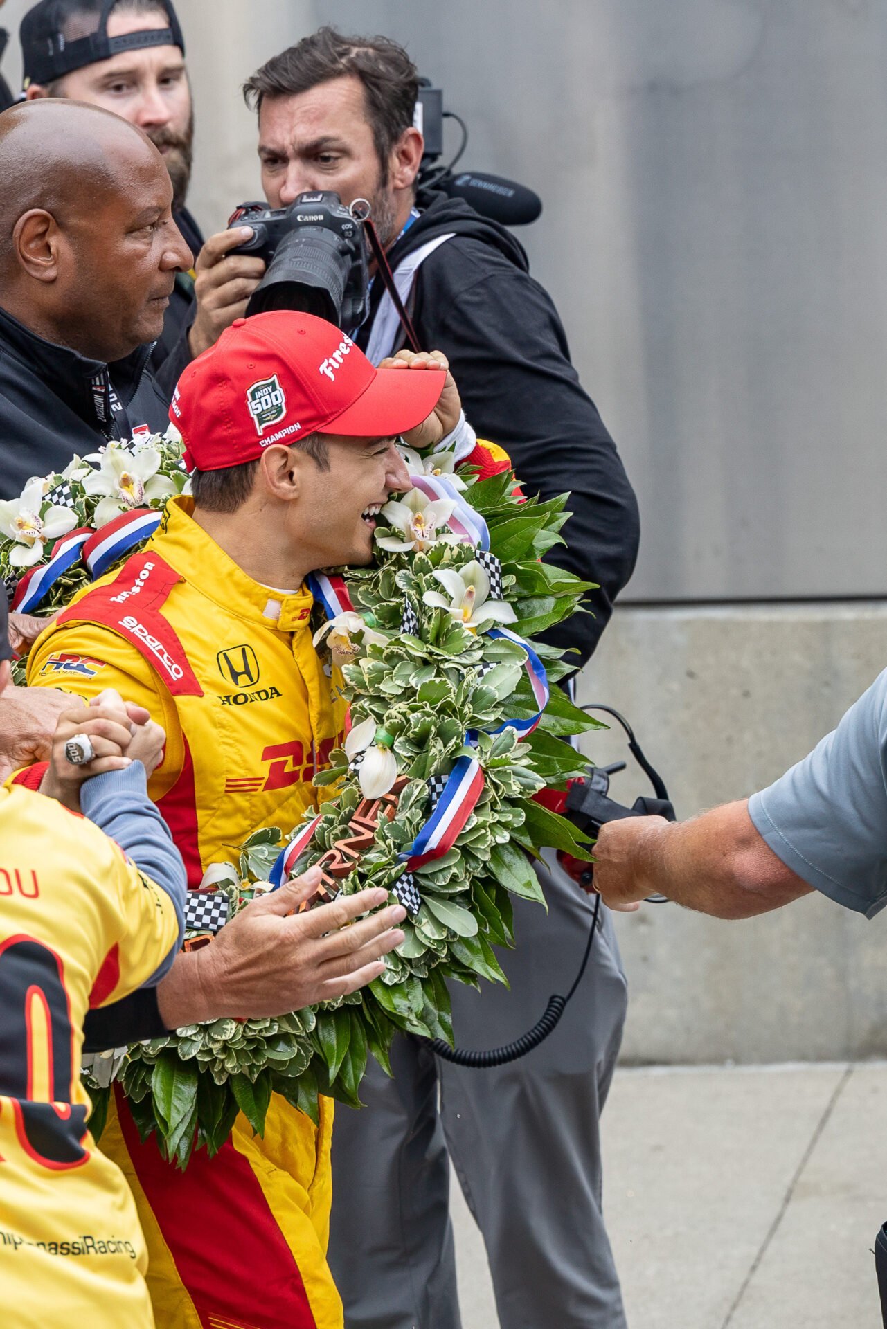Alex Palou Celebrates While Wearing Winner Wreath