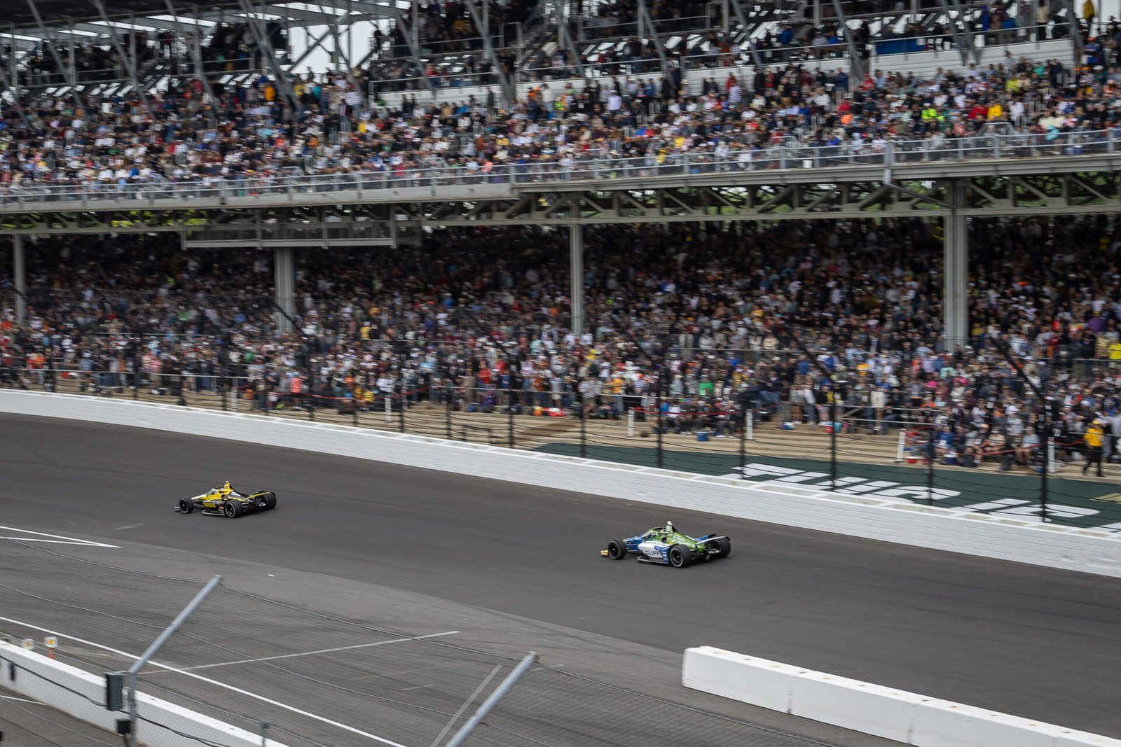 Colton Herta Leads Helio Castroneves Into Turn 1 During 2025 Indy 500