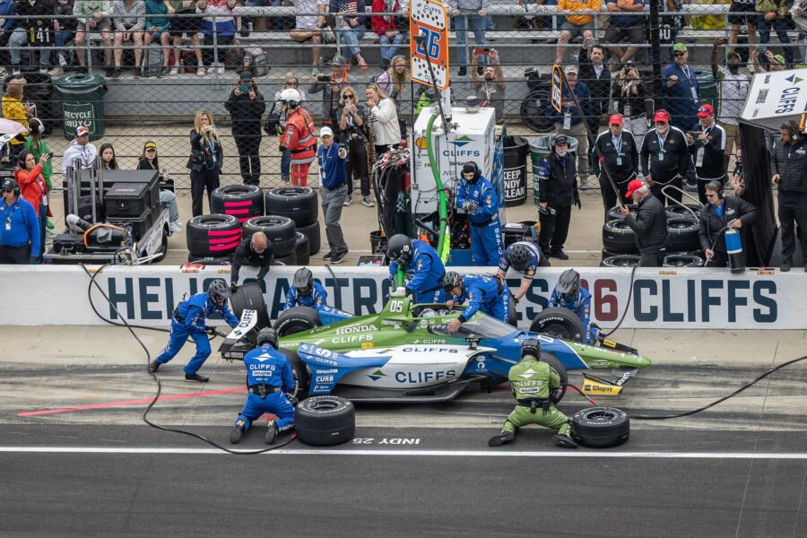 Helio Castroneves Team Jump Into Action During Pit Stop At 2025 Indy 500