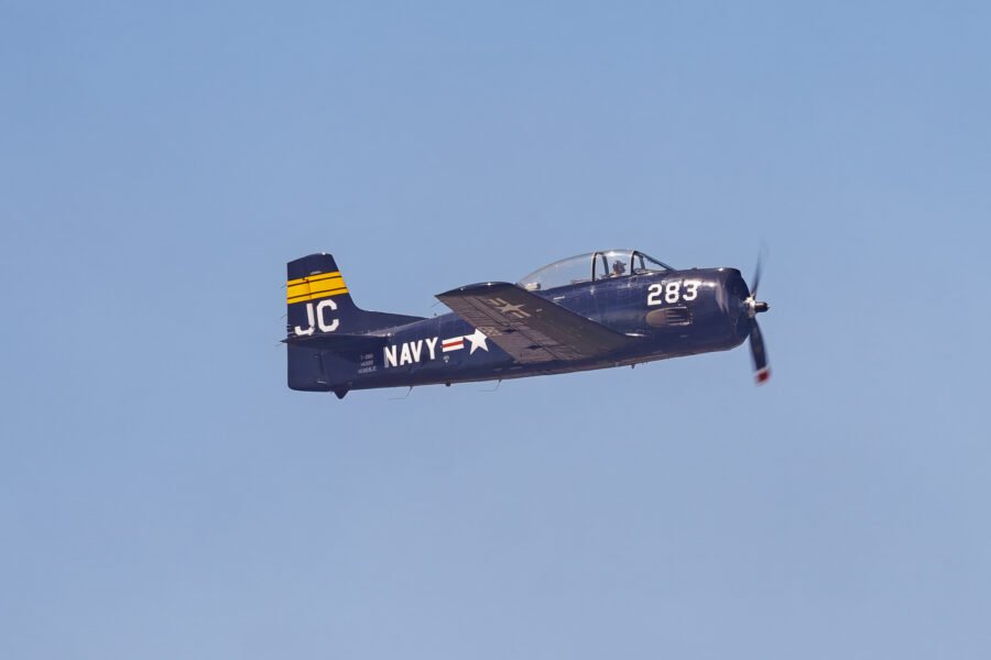 Navy Grumman Avenger Torpedo Bomber Makes Pass To Right