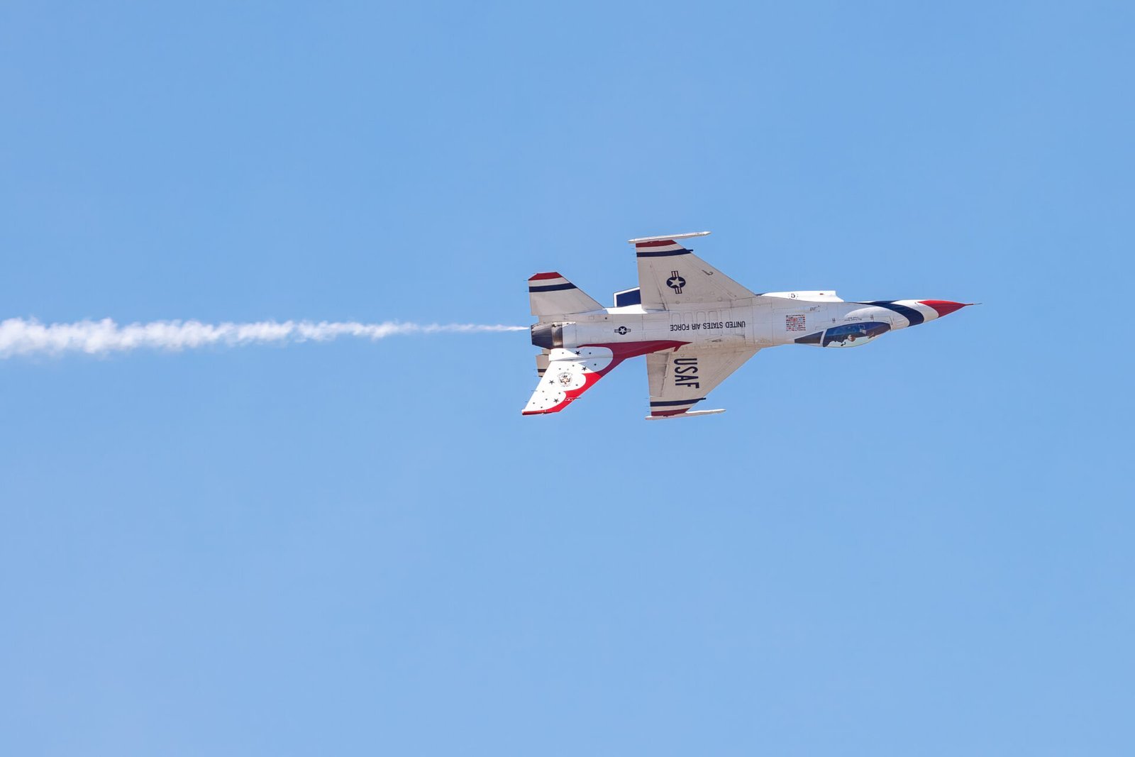 Air Force Thunderbird Solo Rolls To Right