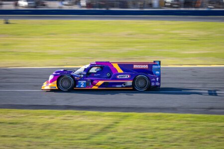 2 United Autosports Oreca Exiting the International Horseshoe at Daytona International Speedway - 2024 2 United Autosports Oreca Exiting International Horseshoe At Day