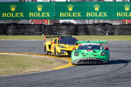 77 AO Racing Porsche through the International Horseshoe at Daytona International Speedway - 2024 77 Ao Racing Porsche Through International Horseshoe At Daytona