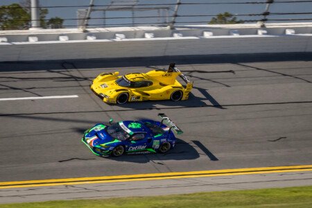 85 JDC-Miller Motorsports Porsche and 47 Cetilar Racing Ferrari in Turn 1 at Daytona International Speedway - 2024 85 Jdc Miller Motorsports Porsche And 47 Cetilar Racing Ferrari