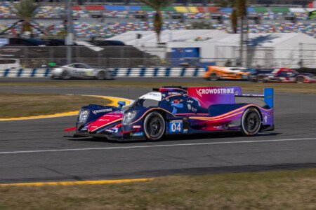 04 Crowdstrike Racing Oreca Exiting the International Horseshoe at Daytona International Speedway - 2025 04 Crowdstrike Racing Oreca Exiting International Horseshoe At D
