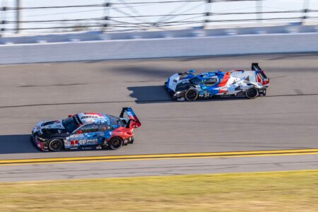 1 Paul Miller Racing BMW and 24 M Team RLL BMW on the Turn 1 Banking at Daytona International Speedway - 2025 1 Paul Miller Racing Bmw And 24 M Team Rll Bmw On Turn 1 Banking