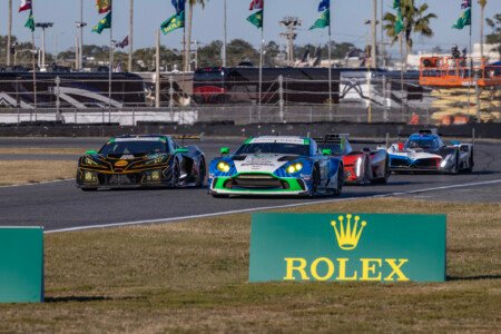 13 AWA Corvette Passes Cars Heading Toward the West Horseshoe at Daytona International Speedway - 2025 13 Awa Corvette Passes Cars Heading Toward West Horseshoe At Day