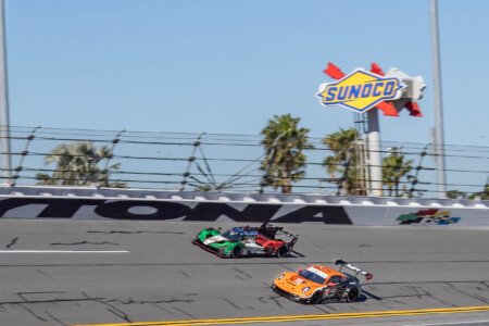 63 Automobili Lamborghini and the 20 Proton Competition Porsche on the Turn 1 Banking at Daytona International Speedway - 2025 63 Automobili Lamborghini And 20 Proton Competition Porsche On T